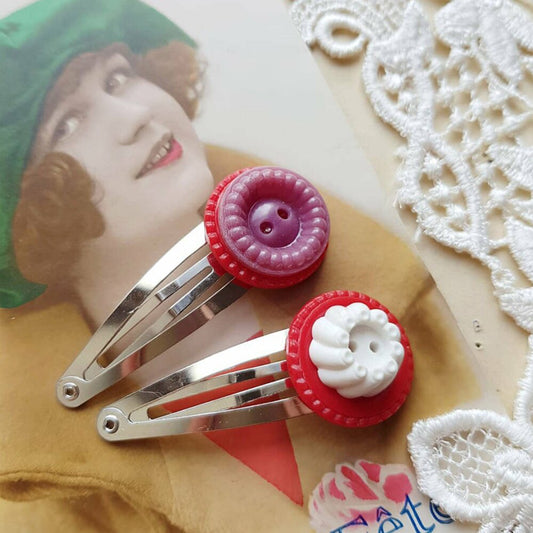 "Elevate your look with our Vintage Chic Hair Clip Set featuring charming vintage French buttons!"
