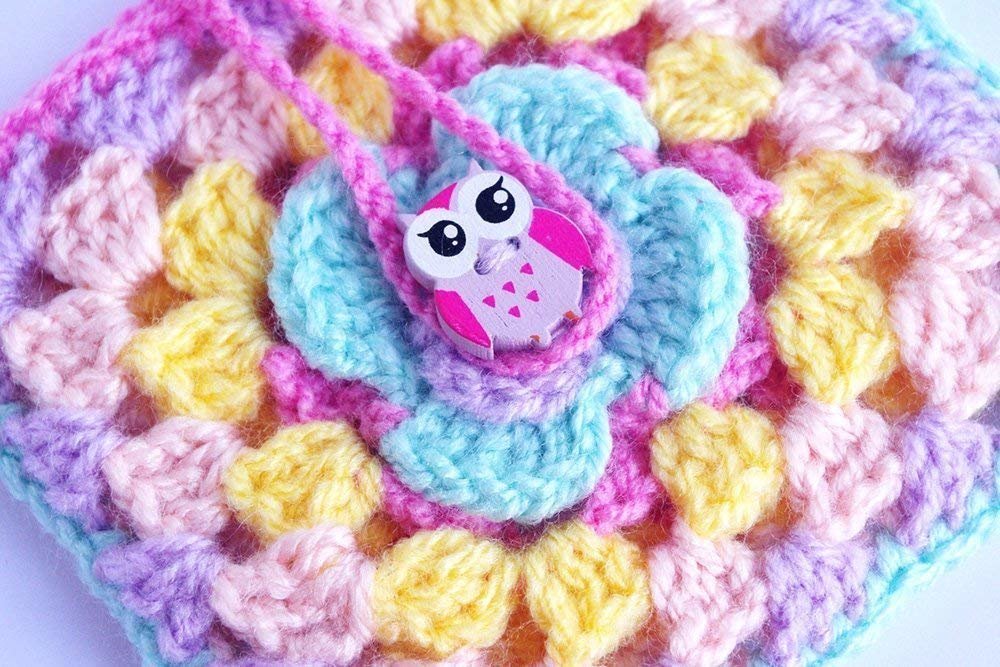 "Carry your essentials in style with our adorable Kawaii Rainbow Owl Crochet Pouch – handmade with love!"