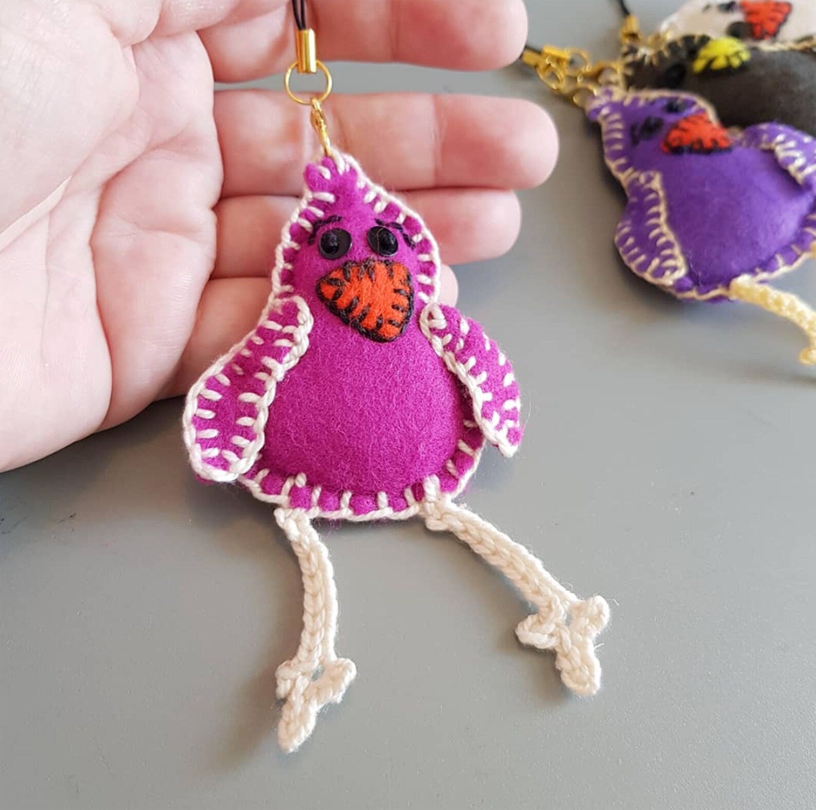 "Crafted to perfection by CocoFlower, our Felt Bird Keychain Plush is a must-have!"