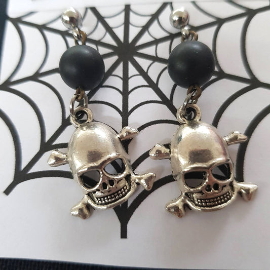 "Rock On: Rebel Skull and Onyx Earrings for the Bold - Halloween skull earrings"