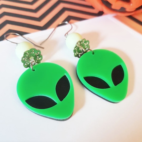 "Embrace your inner space explorer with these unique Alien Earrings, handmade with love and attention to detail."