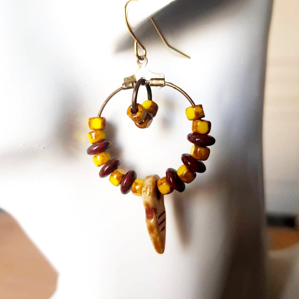 "Bold Statement Ethnic Hoop Earrings: Featuring Stunning Picasso Glass Beads in Red and Yellow!"