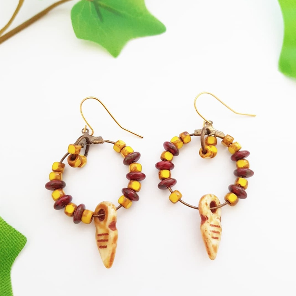 "Eye-Catching Elegance: Picasso Red and Yellow Glass Beads Adorn these Stunning Ethnic Hoop Earrings!"