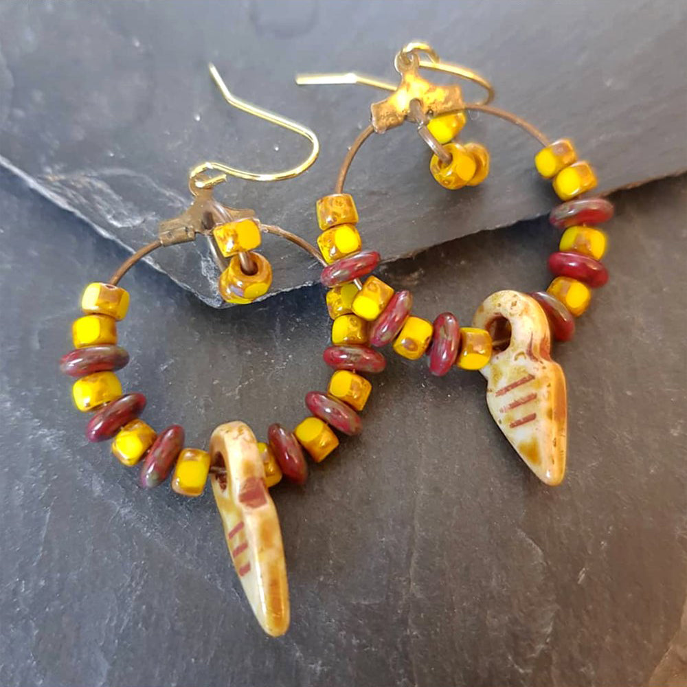 "Artisan Ethnic Hoop Earrings: Elevate Your Style with Vibrant Red and Yellow Glass Beads!"