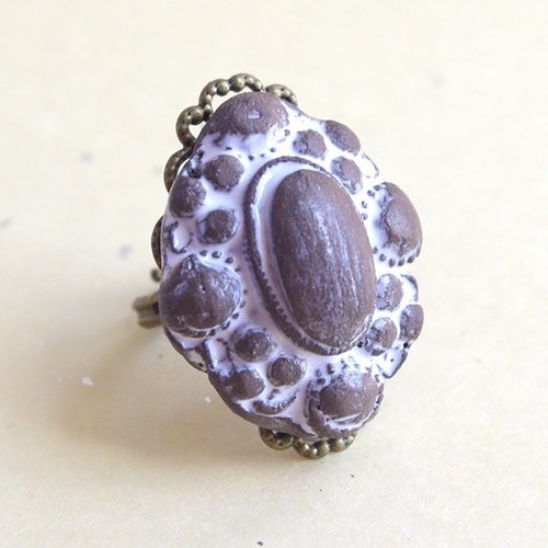 "Make a statement with our Dark Brown Ceramic Baroque Ring. Perfect for any occasion. 🌟🖤"