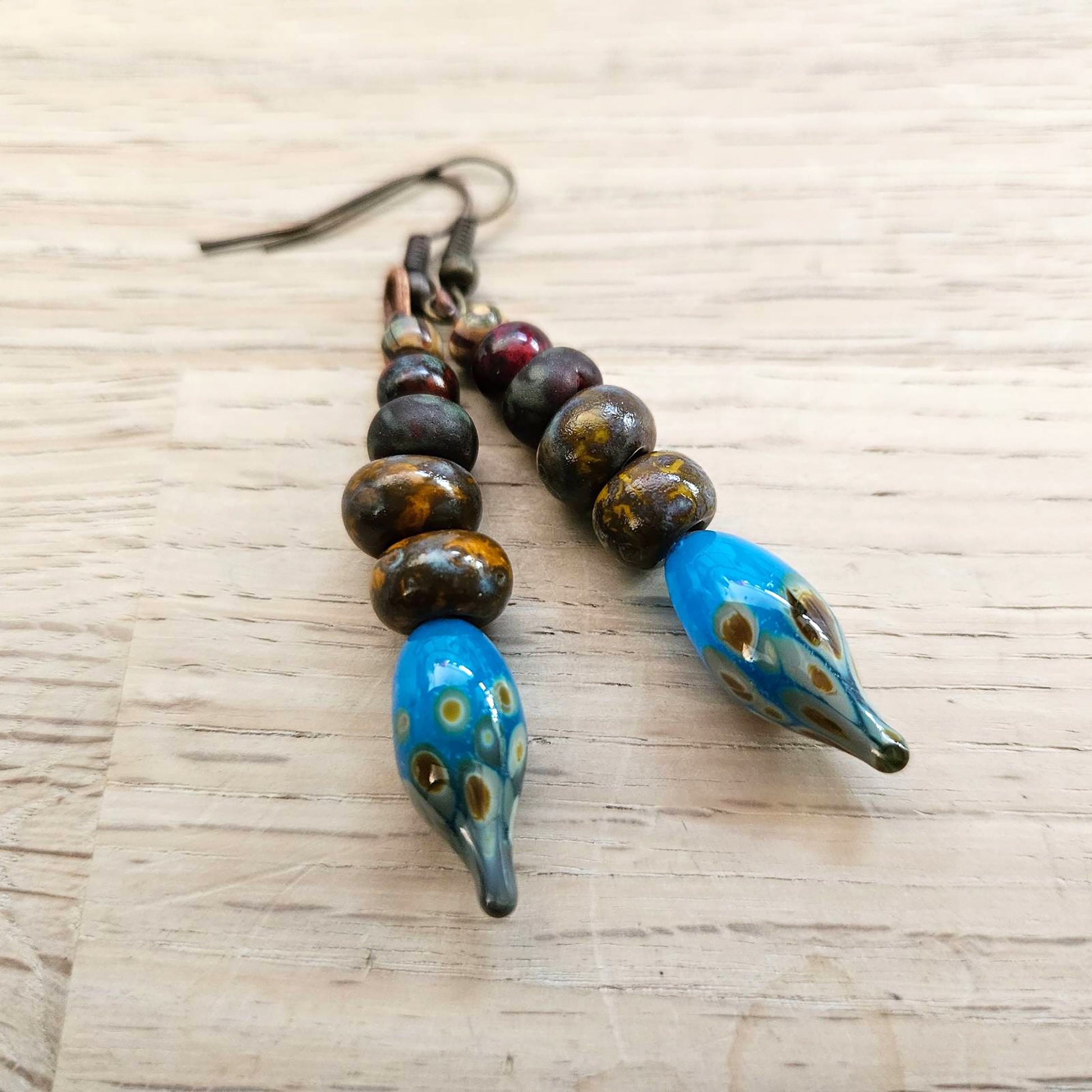 "Artistry at its Finest: Blue Lampwork Earrings Spike for the Free-Spirited"