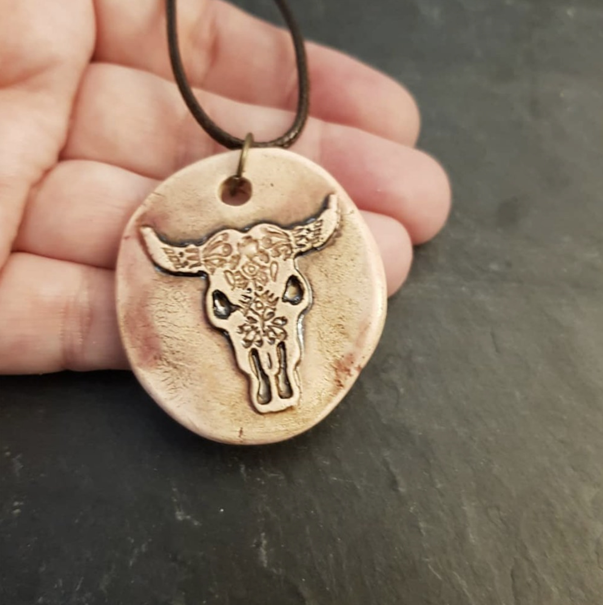 "Capture the Spirit of the Wild West with our Cow Skull Necklace."