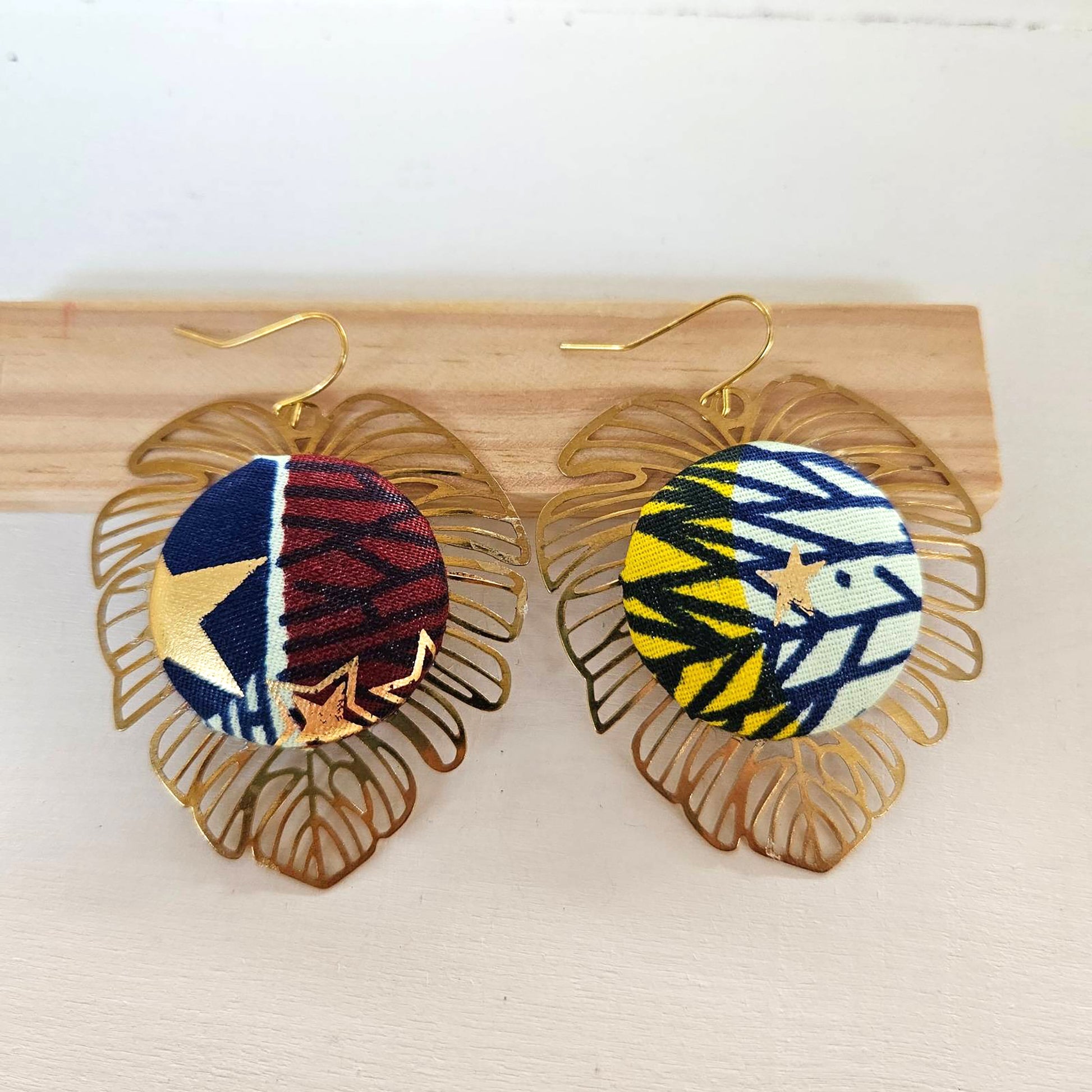 "Channel Vibrant Vibes: Golden Monstera Earrings Wax Fabric for Bold Fashionistas"
