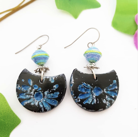 "Experience the essence of Japanese artistry with our Shibori Indigo half moon earrings."