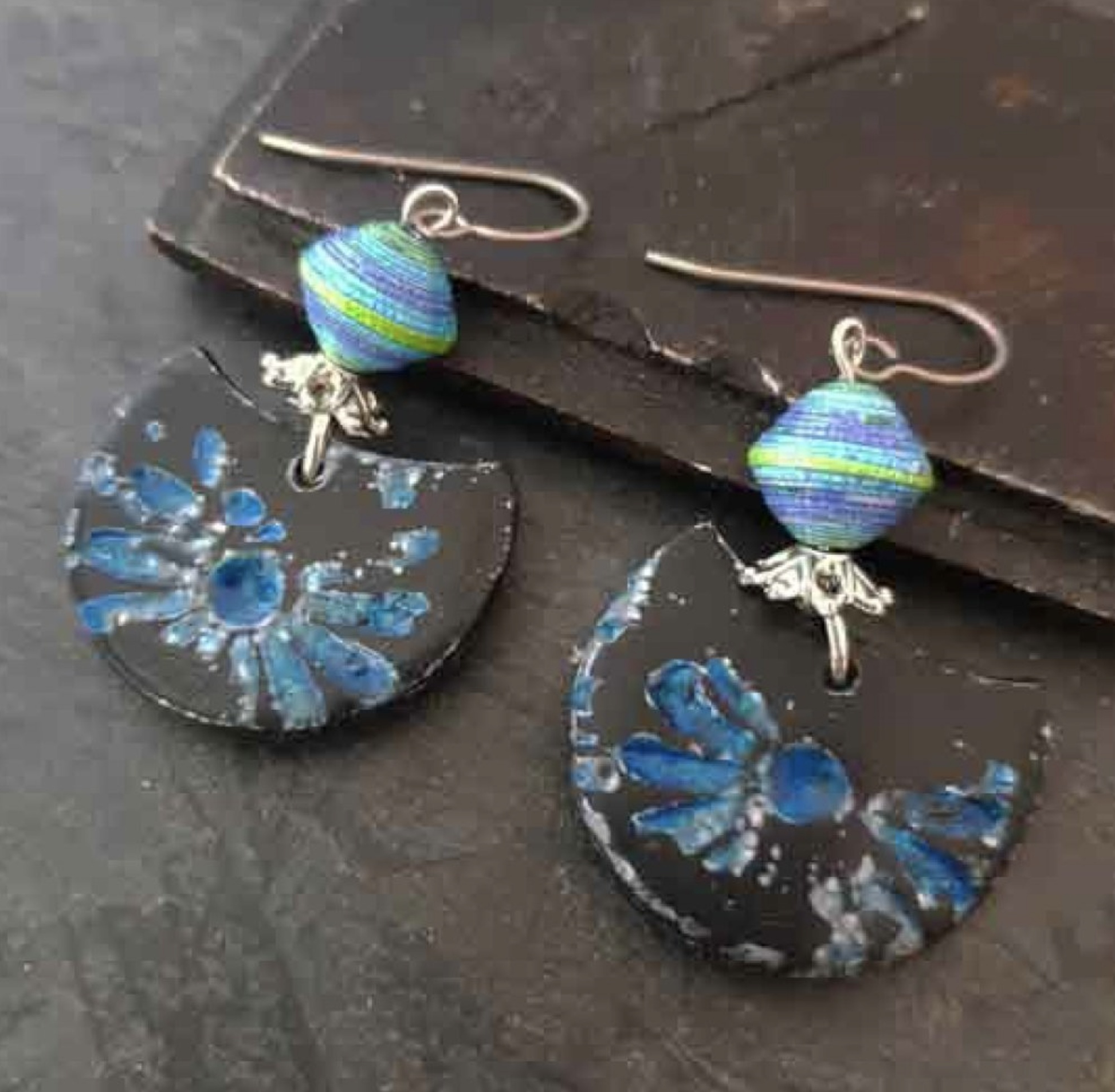 "Indulge in the rich hues of Shibori patterns adorning our Blue Green paper beads and polymer clay half moons."