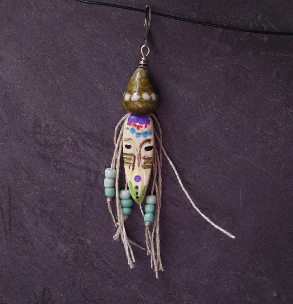 African Mask Single Earring - Embrace tribal vibes with our handcrafted ceramic mask earrings! by CocoFlower