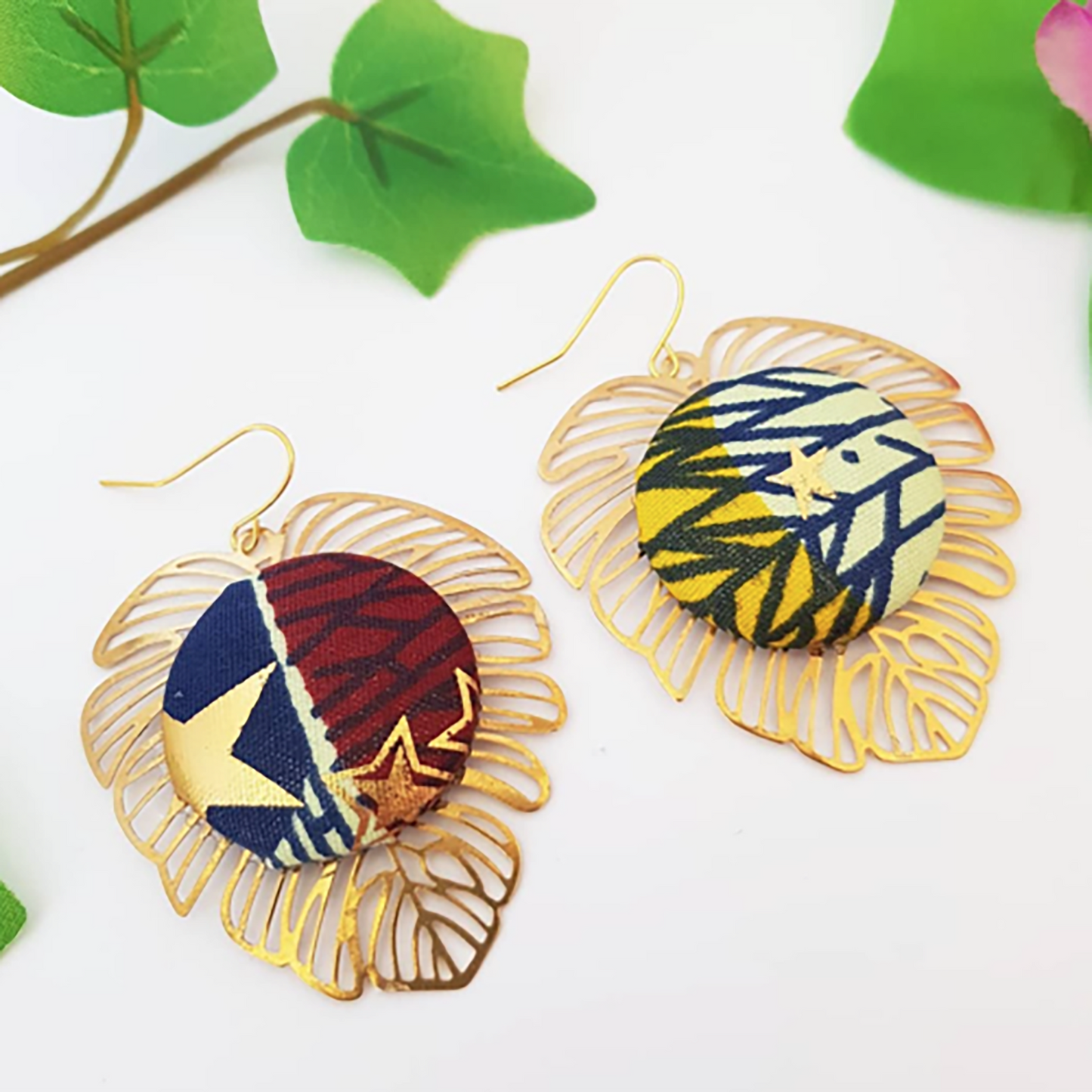 "Crafted with Love: Golden Monstera Earrings from Authentic African Fabric"