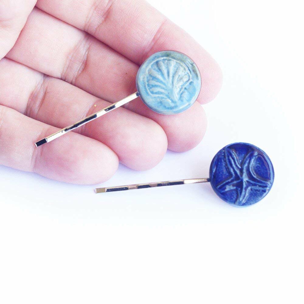 "Make a splash with our delightful Seashell Bobby Pins."