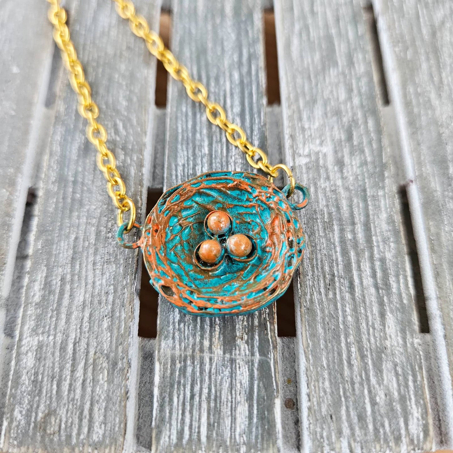"Birdnest Pendant - Make a statement with our handcrafted Bird's Nest Pendant. 🥚💫"