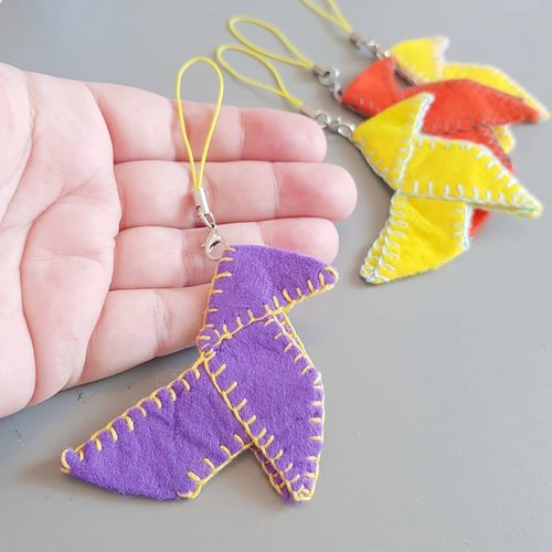 "Express your playful side with our CocoFlower-designed Felt Bird Keychains – available in Yellow, Orange, or Purple hues!"