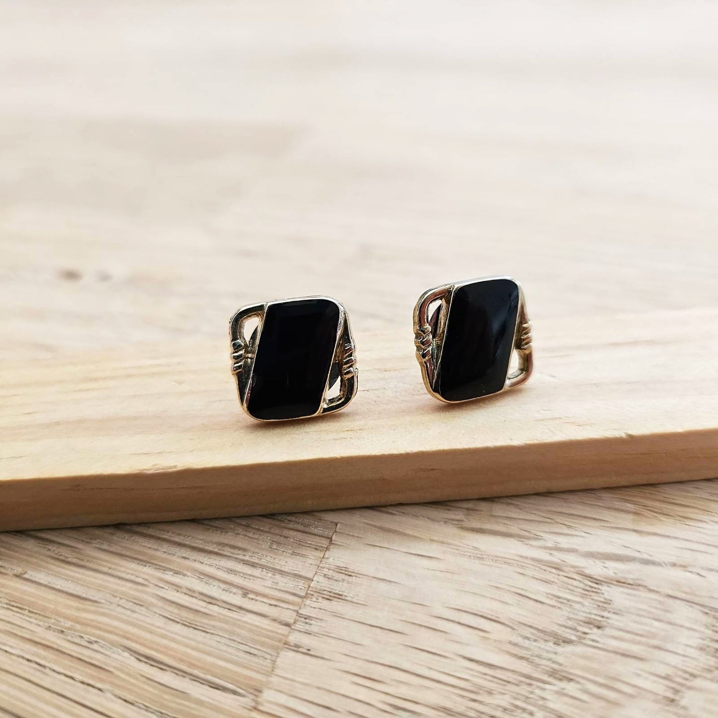 "Rectangle stud earrings. - Elevate your style with these timeless black rectangular stud earrings."