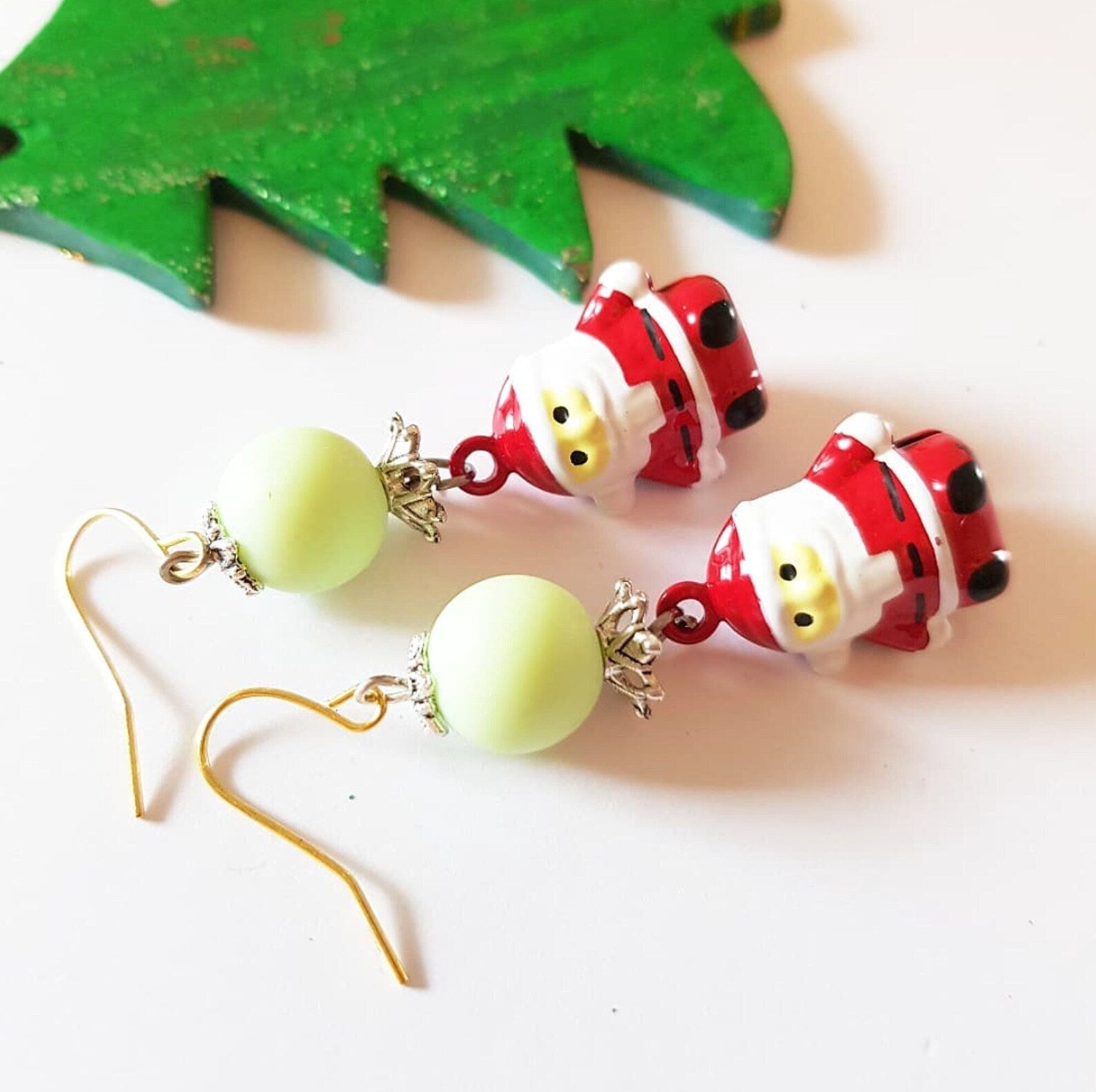 Sleigh bell Santa Claus earrings