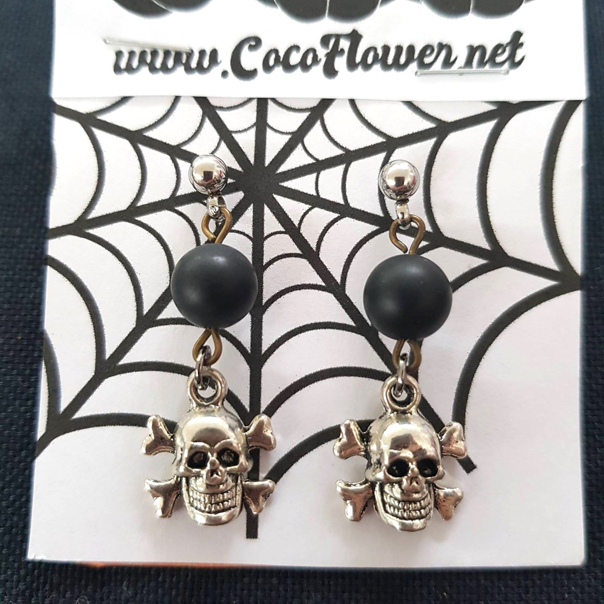 "Unleash Your Edge: Rebel Skull and Onyx Earrings Command Attention"